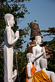 Ayutthaya, Thailand. Wat Yai Chai Mongkhon, statues group of Buddha with disciples. 